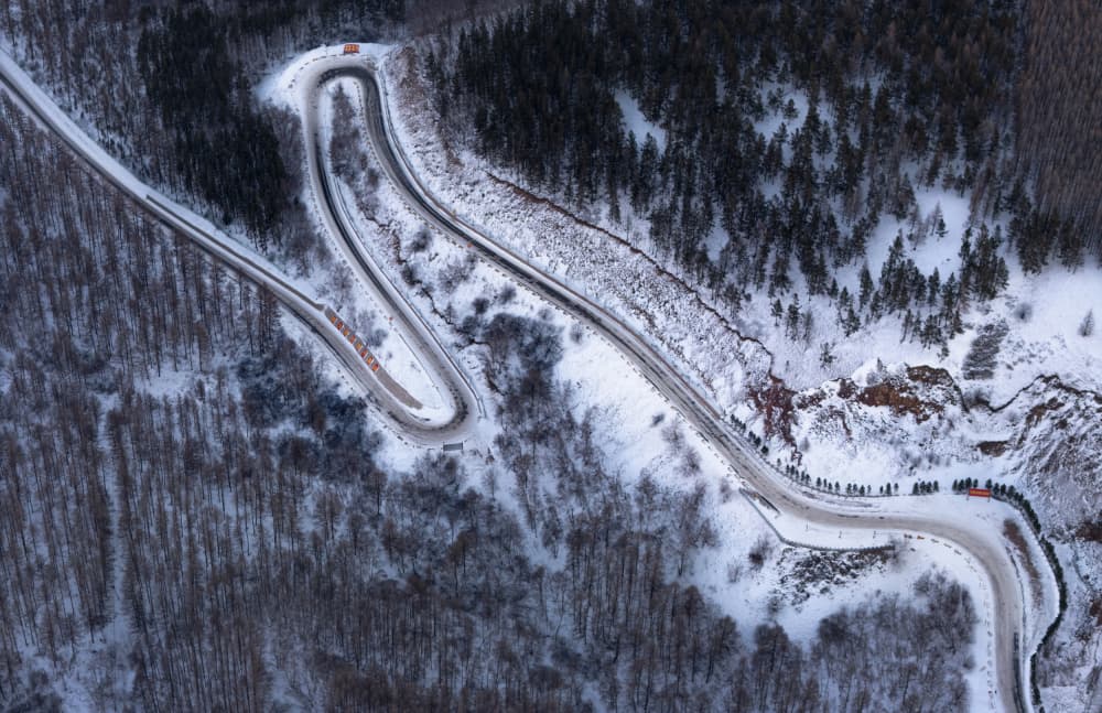 Winding Snowy Mountain Road by Dennis Zhang — canvas wall art