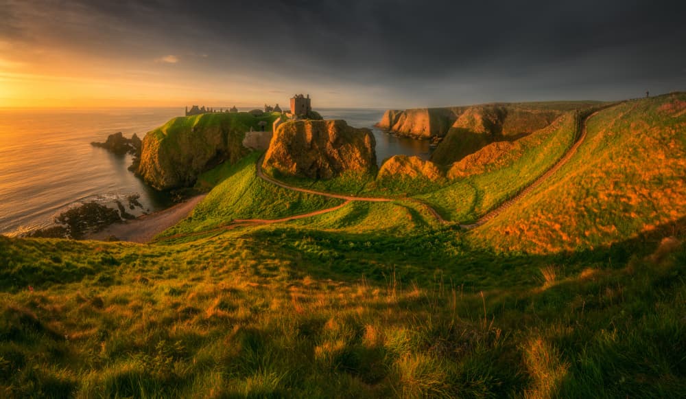 Clifftop Castle Sunset by Tomasz Rojek — canvas wall art
