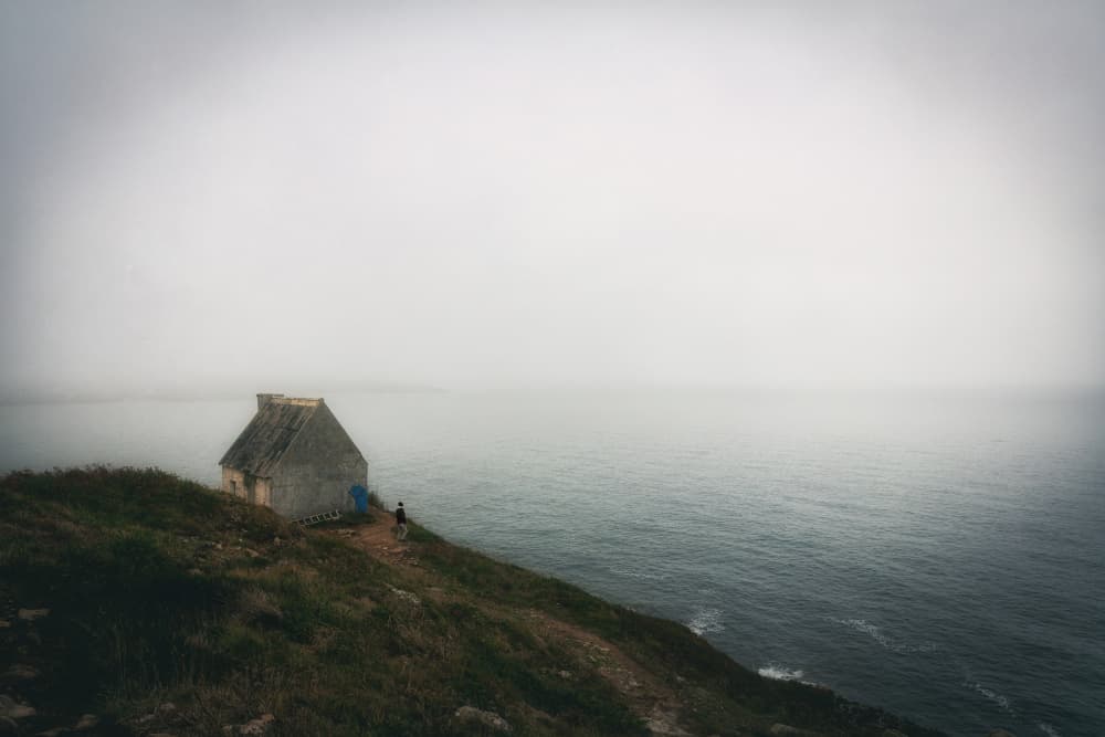 Misty Coastal House by Uschi Hermann — canvas wall art