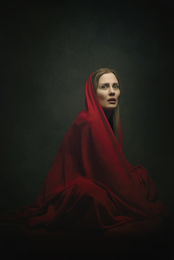 Pensive Woman in Red by Moein Hasheminasab — canvas wall art