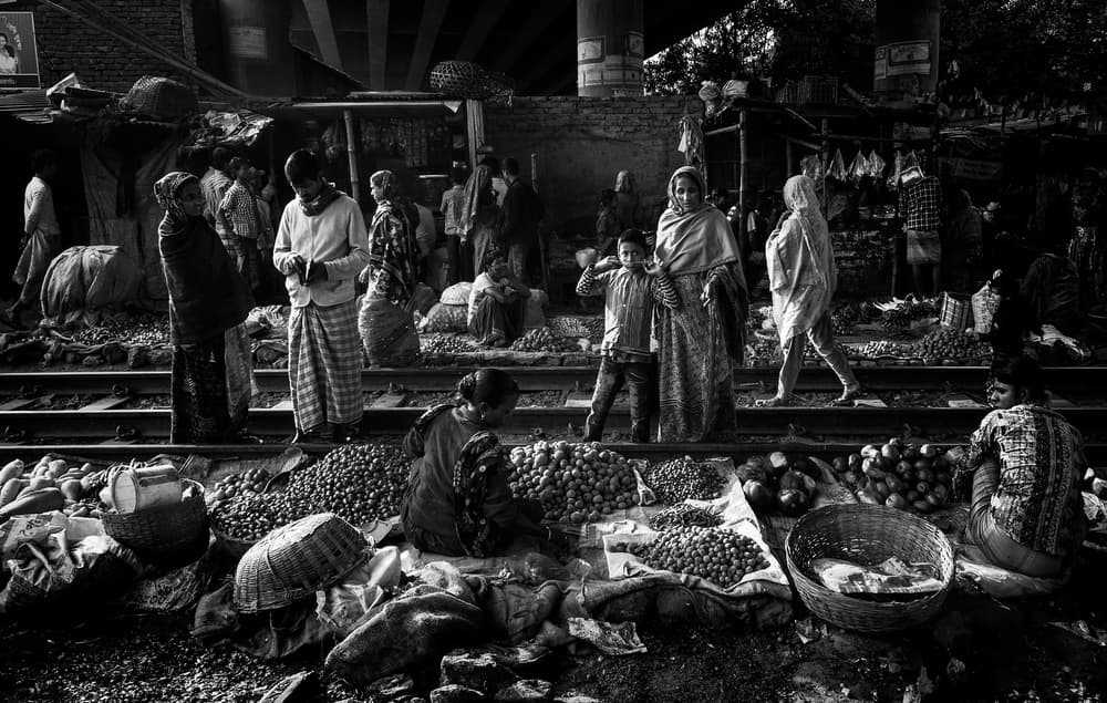 Bustling Street Market by Joxe Inazio Kuesta Garmendia — canvas wall art