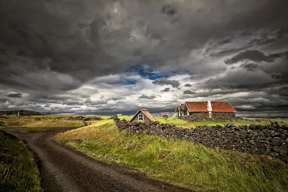 Stormy Countryside Cottages by Þorsteinn H. Ingibergsson — canvas wall art