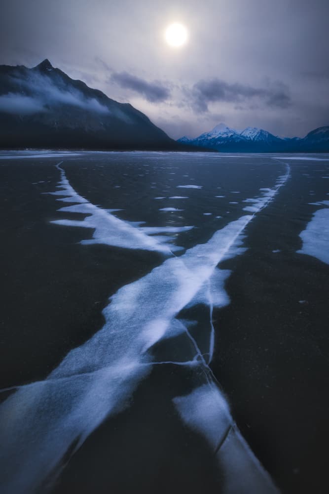 Frozen Mountain Lake by Alex Zhao — canvas wall art