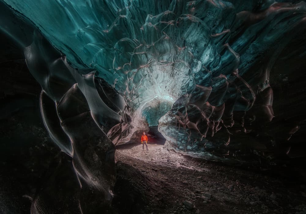 Blue Ice Cave Explorer by Wim Denijs — canvas wall art