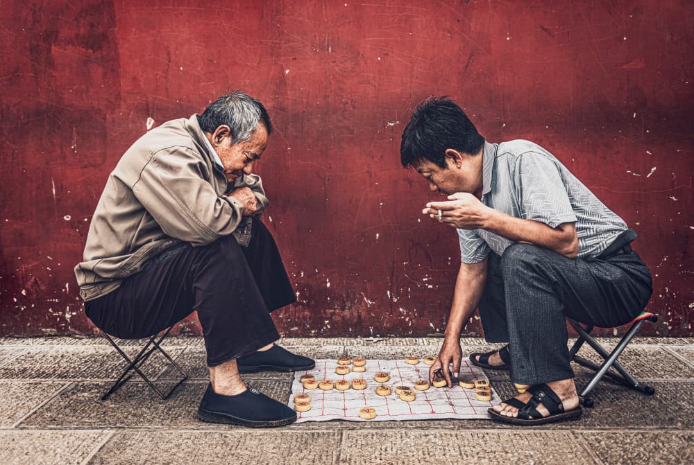 Street Chess Game by Marco Tagliarino — canvas wall art