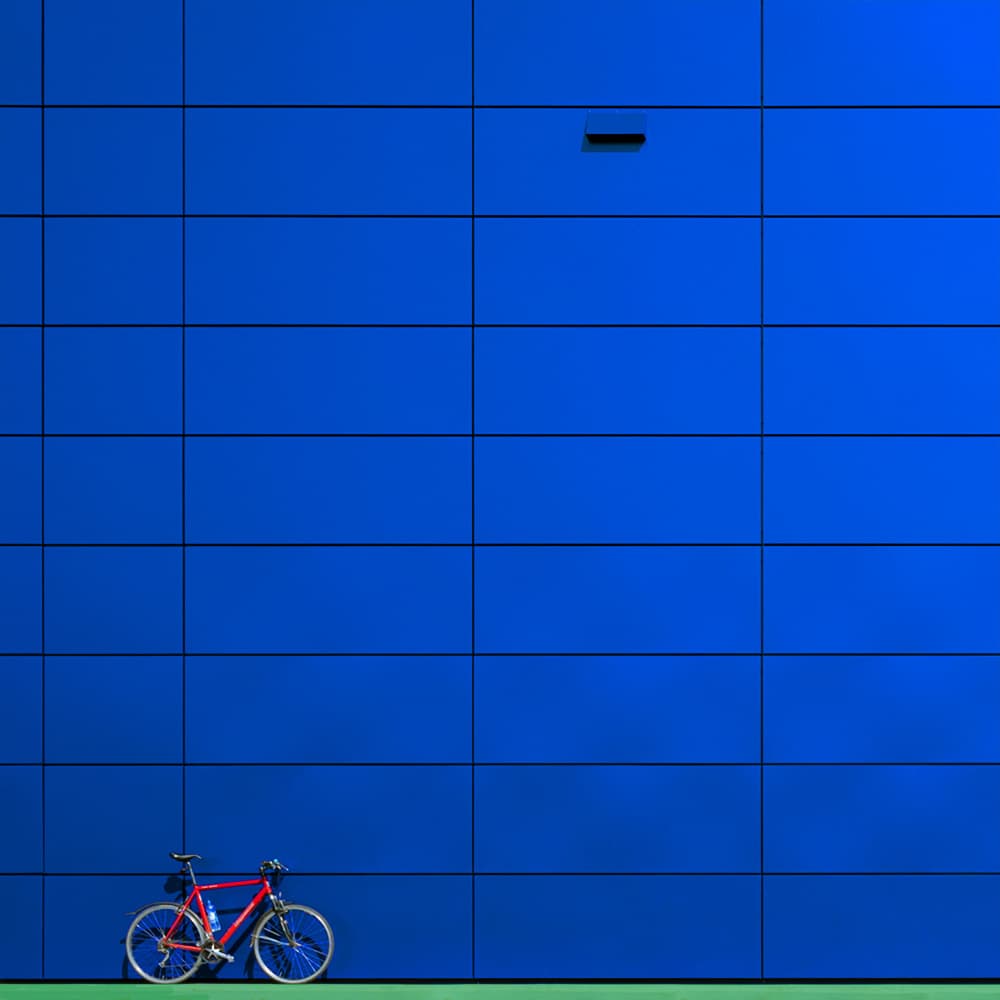 Red Bike Blue Wall by FranzStaab — canvas wall art