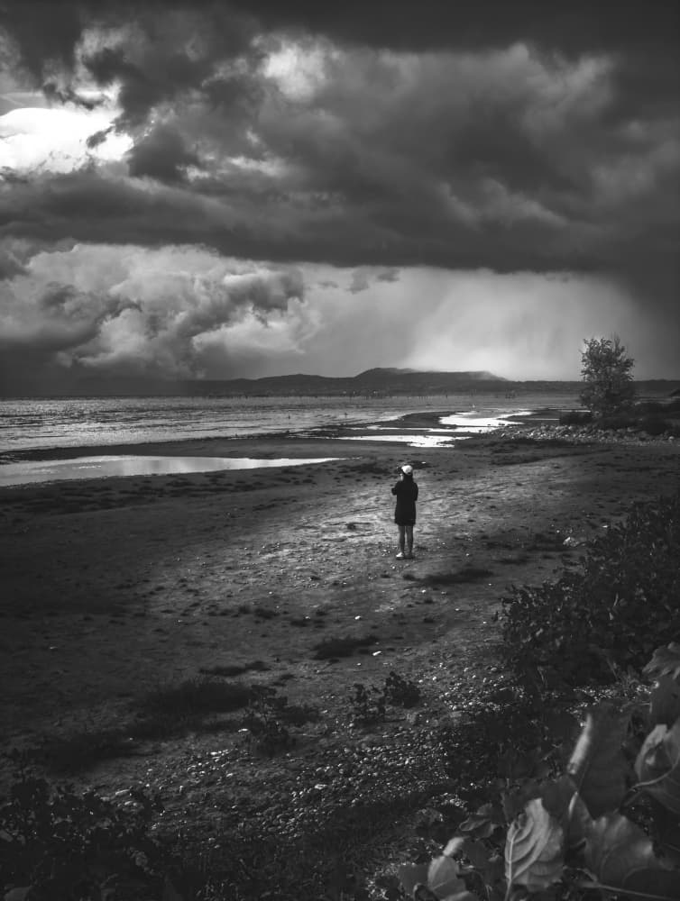 Stormy Beach Solitude by Enrico Sottocorna — canvas wall art