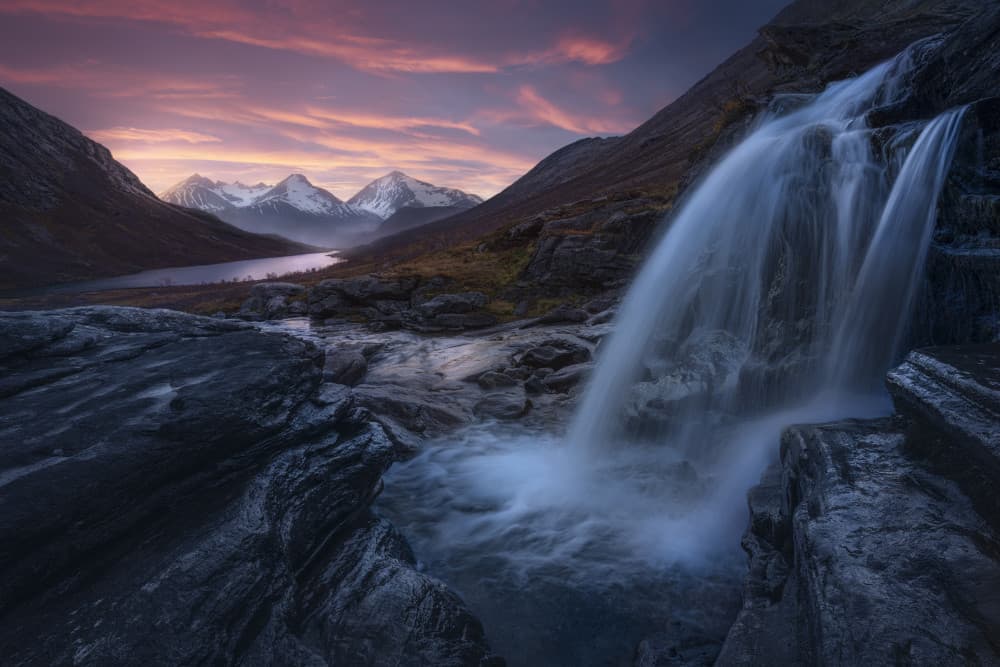 Alpine Waterfall Sunset by Ole Henrik Skjelstad — canvas wall art