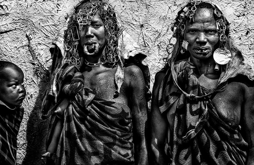 Adorned Tribal Women by Joxe Inazio Kuesta Garmendia — canvas wall art