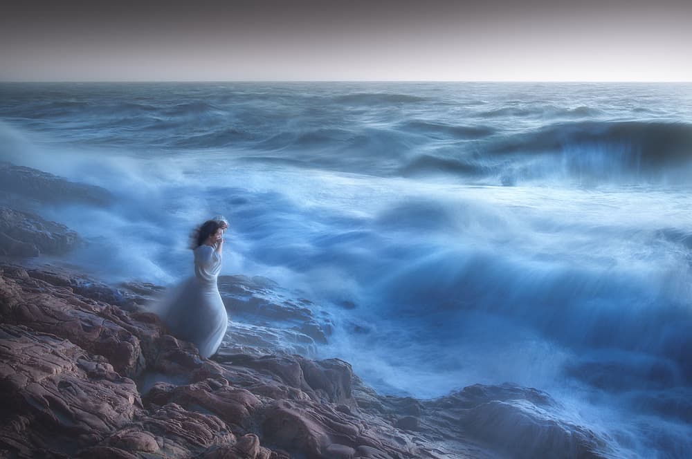 Woman by Misty Ocean by Paolo Lazzarotti — canvas wall art