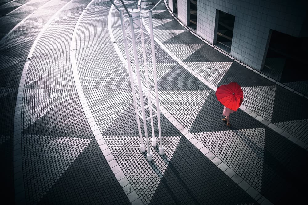 Red Umbrella Urban Path by Daisuke Kiyota — canvas wall art