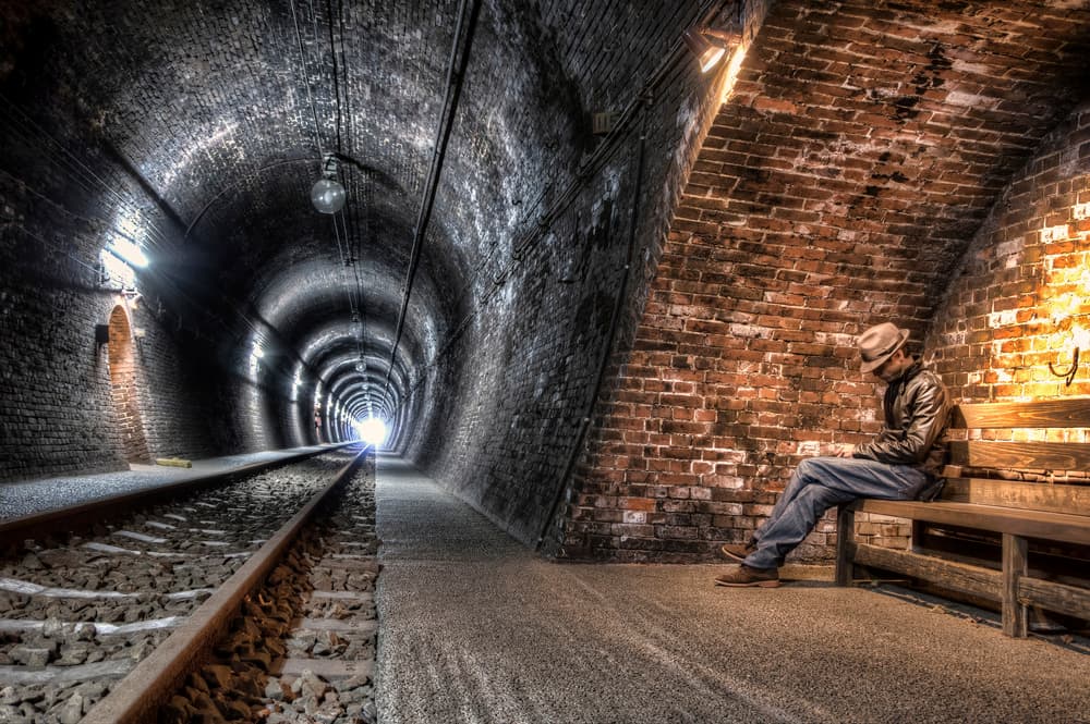 Man Waiting in Tunnel by Tomoshi Hara — canvas wall art