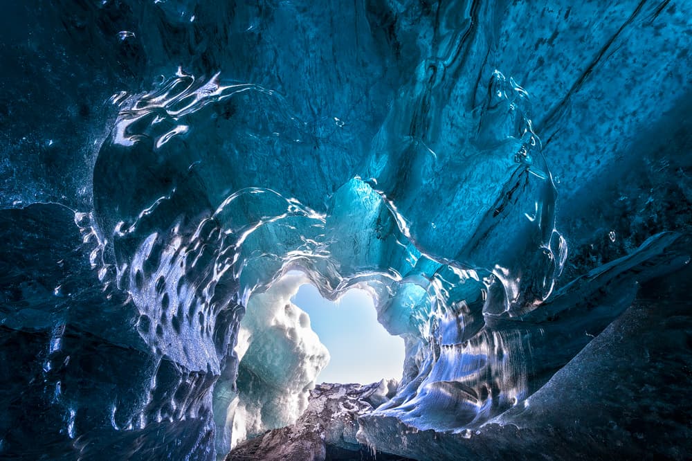 Blue Ice Cave Archway by Karsten Wrobel — canvas wall art