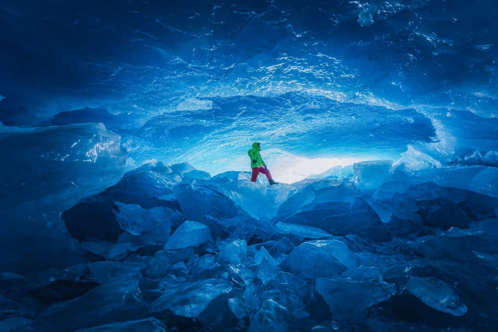Blue Ice Cave Explorer by Yongnan Li (李永男) — canvas wall art