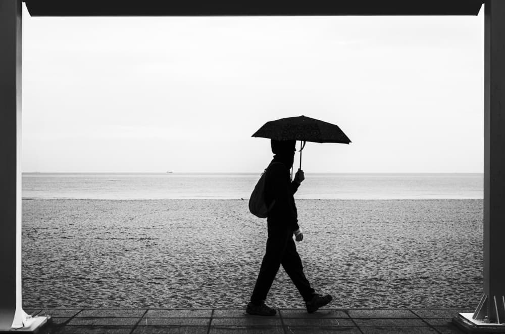 Rainy Day Beach Walk by Swen MUN — canvas wall art