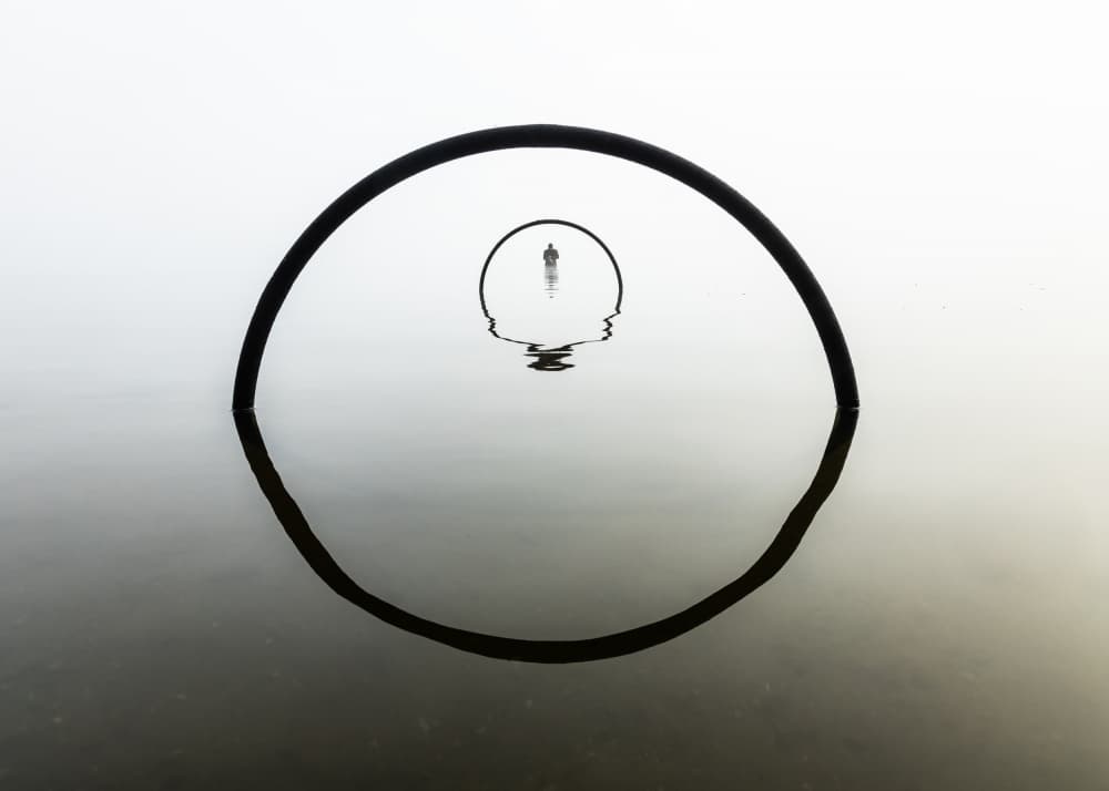 Solitary Figure In Rings by Leszek Paradowski — canvas wall art