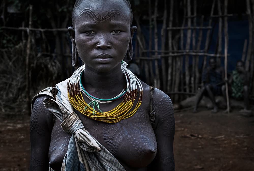 Surma tribe woman. by Joxe Inazio Kuesta Garmendia — canvas wall art