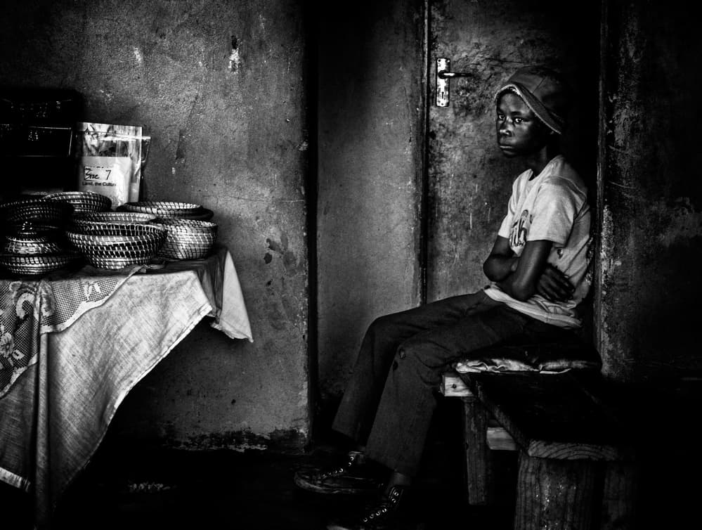 Pensive Boy in Shadows by Joxe Inazio Kuesta Garmendia — canvas wall art