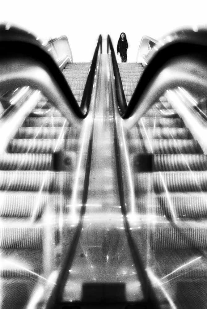 Solitary Escalator Journey by Paulo Abrantes — canvas wall art