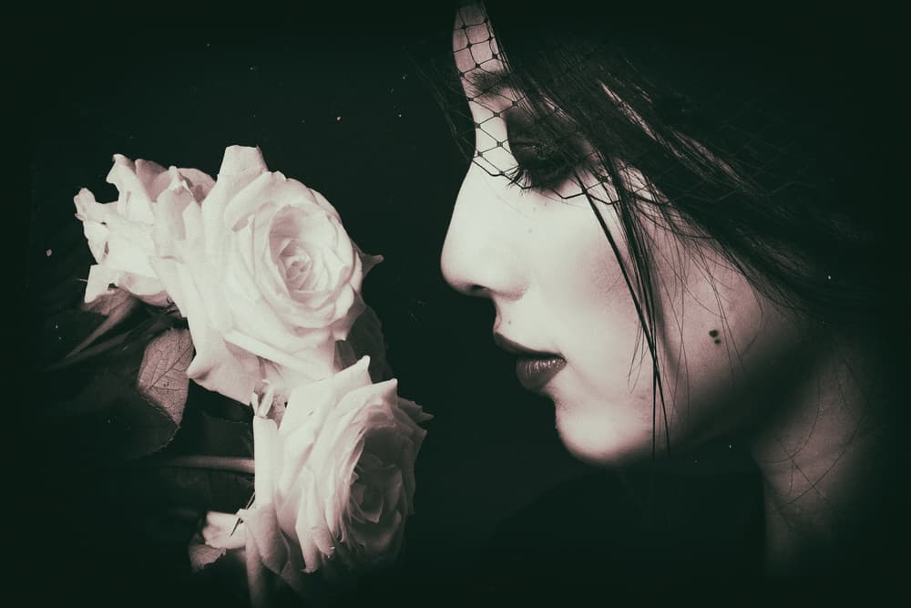 Pensive Woman and Roses by Daisuke Kiyota — canvas wall art