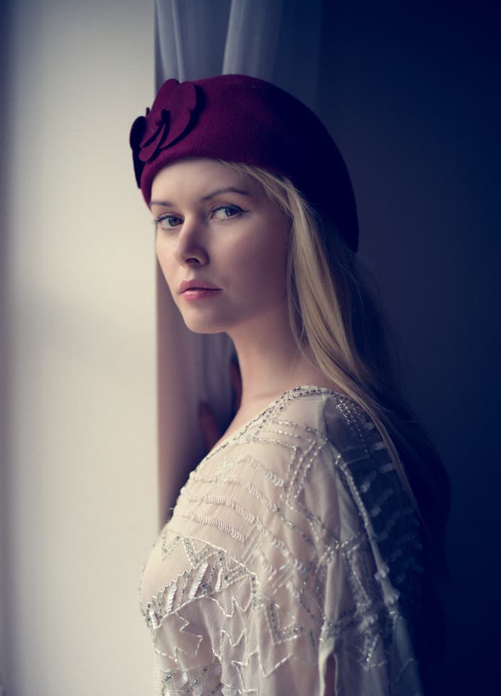 Pensive Woman Beret by Colin Dixon — canvas wall art