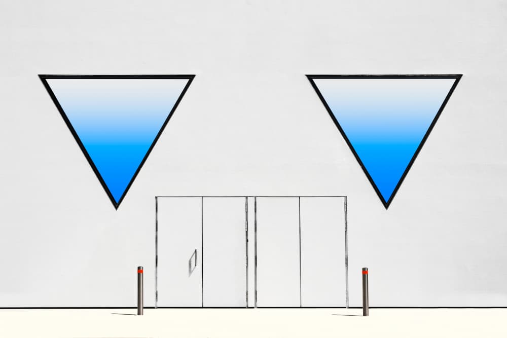 Minimalist Blue Triangles by Rolf Endermann — canvas wall art