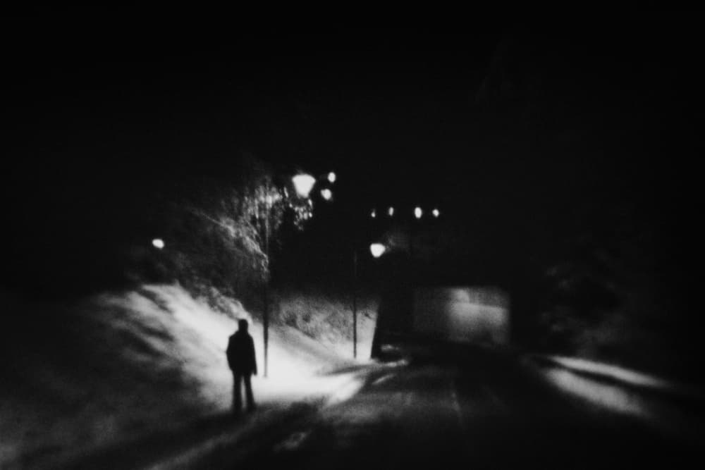 Lone Figure Snowy Night by Elena Raceala — canvas wall art