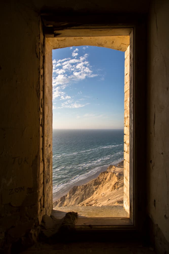 Rustic Window Ocean View by Leif Løndal — canvas wall art