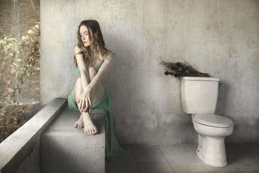 Contemplative Woman Green Dress by Sebastian Kisworo — canvas wall art