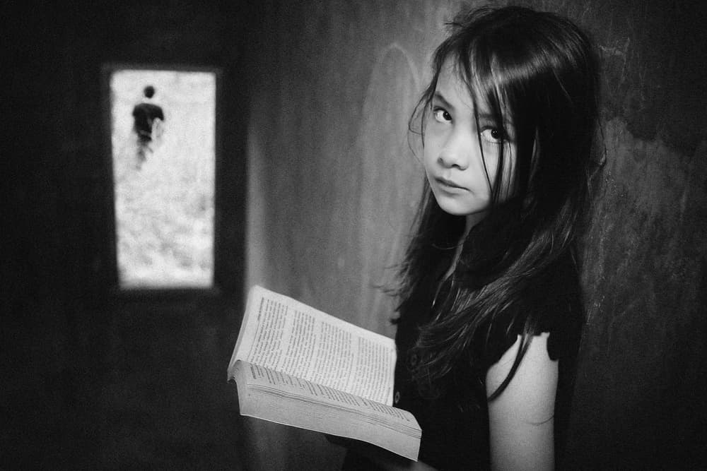 Pensive Girl Reading by Teguh Yudhi Winarno — canvas wall art