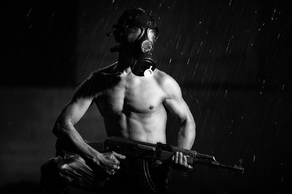 Rainy Gas Mask Soldier by Hari Sulistiawan — canvas wall art