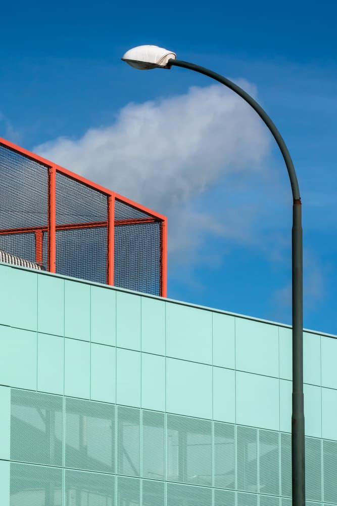 Teal Building Orange Frame by Lus Joosten — canvas wall art