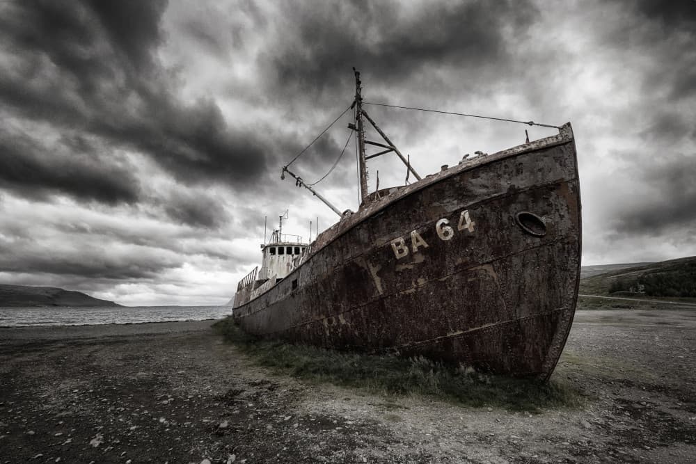 Abandoned Ship Under Dark Sky by Þorsteinn H. Ingibergsson — canvas wall art