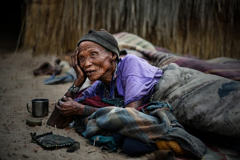 Thoughtful African Elder by Irene Perovich — canvas wall art
