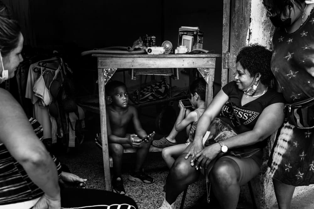 Candid Family Conversations by Ali Khataw — canvas wall art
