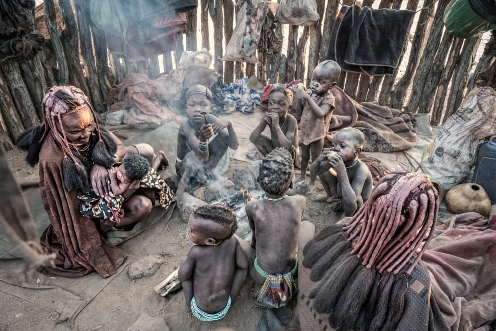 Himba Family Gathering by Trevor Cole — canvas wall art