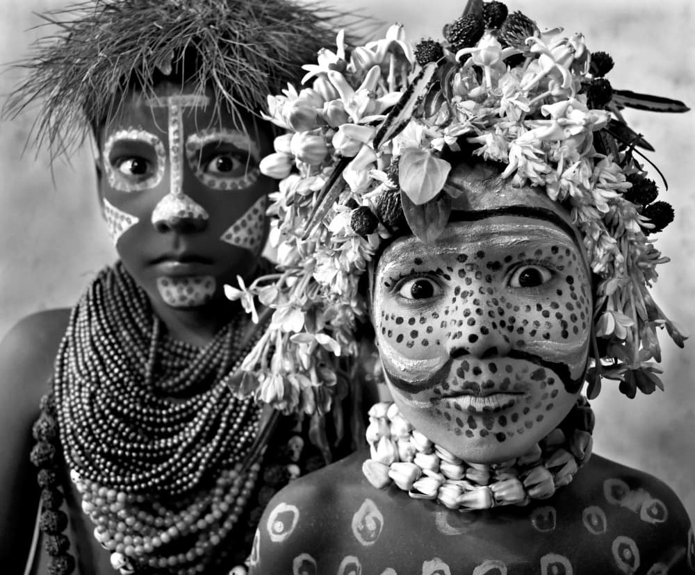 Painted Tribal Faces by Moumita Mondal — canvas wall art