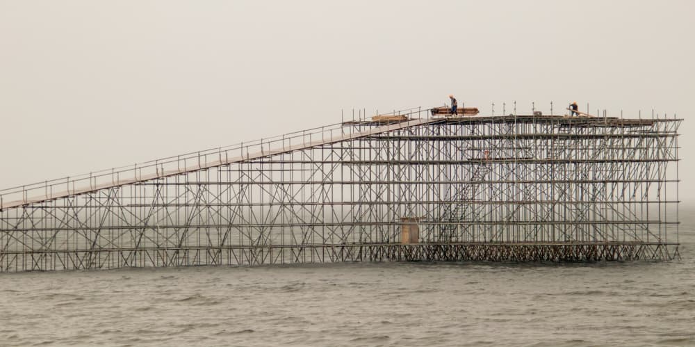 Scaffolding Structure Over Water by Haruyo Sakamoto — canvas wall art