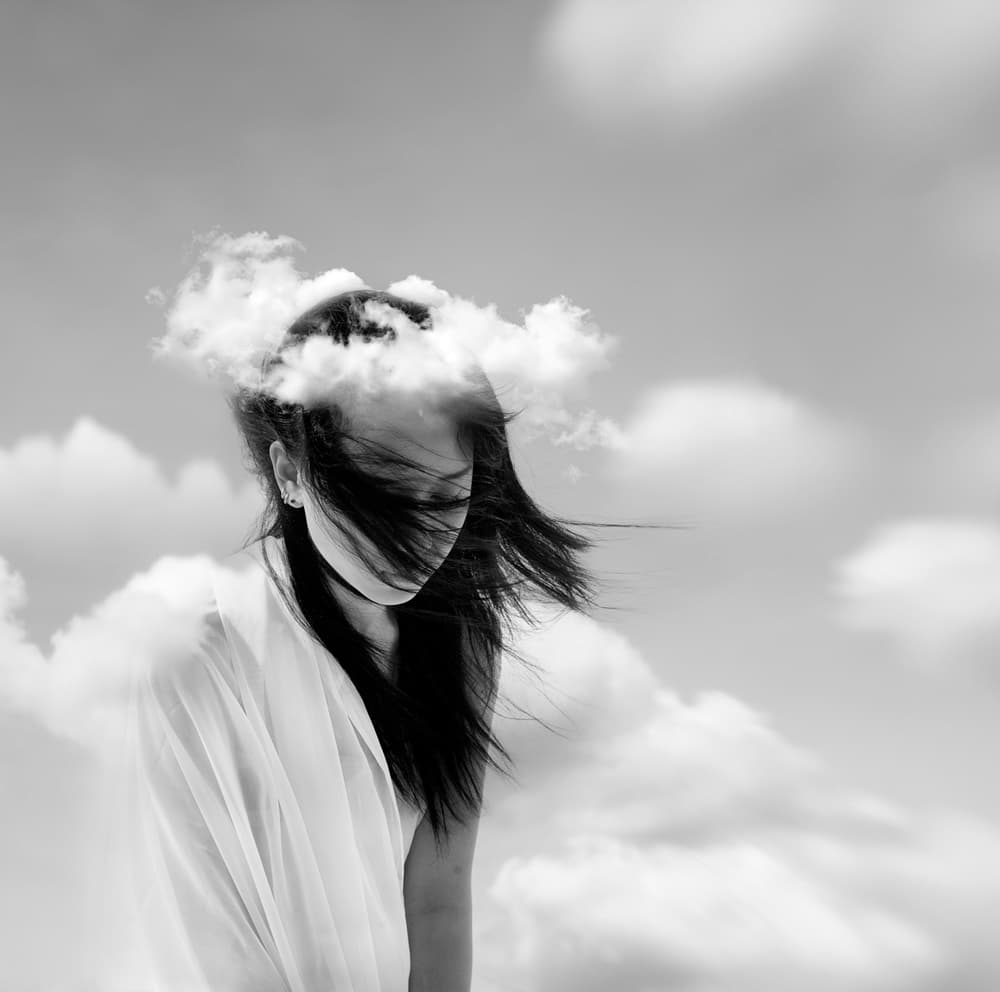 Woman Lost In Clouds by Hari Sulistiawan — canvas wall art