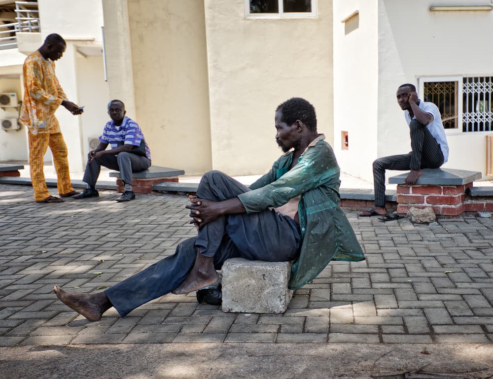 Urban Men Waiting by Lorenzo Grifantini — canvas wall art