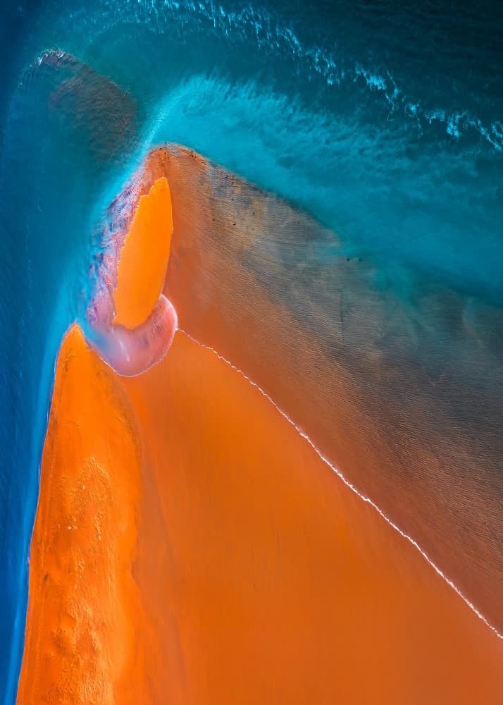 Orange Sand Blue Water by John Fan — canvas wall art