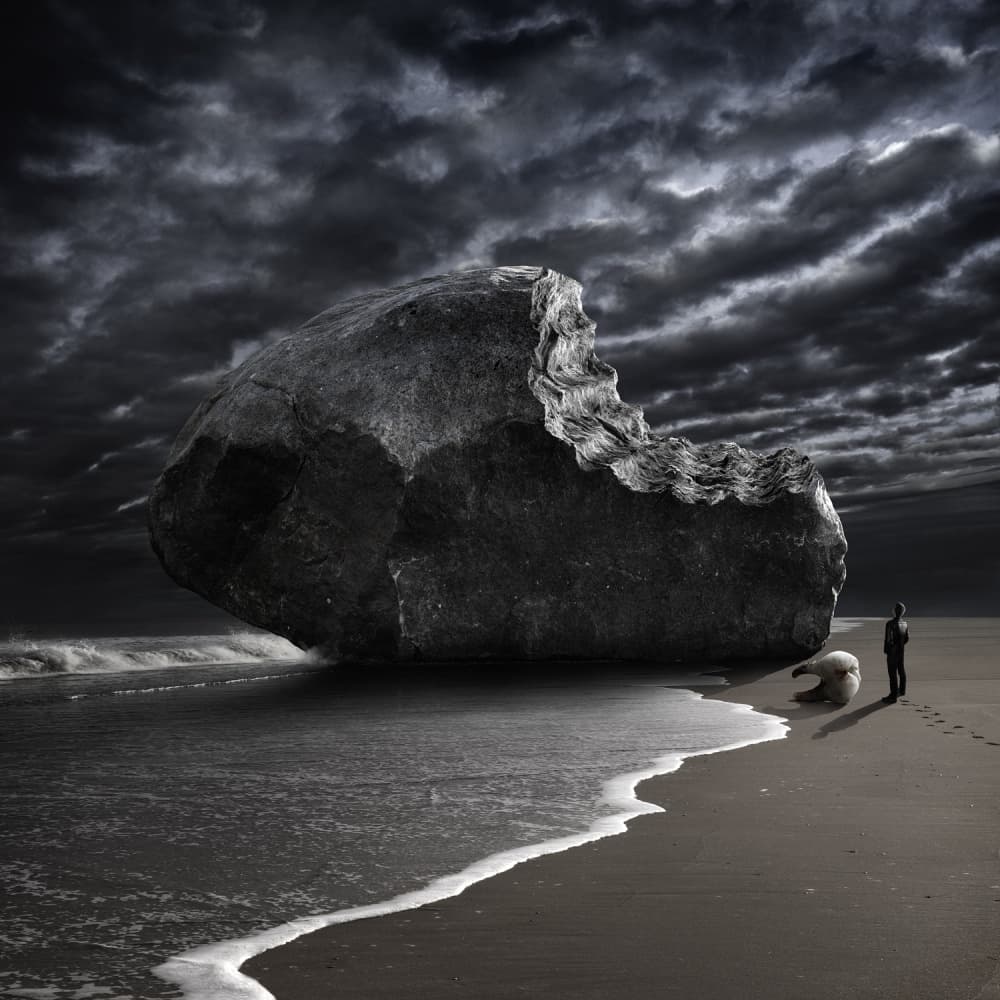 Bitten Rock on Stormy Beach by Christophe Kiciak — canvas wall art
