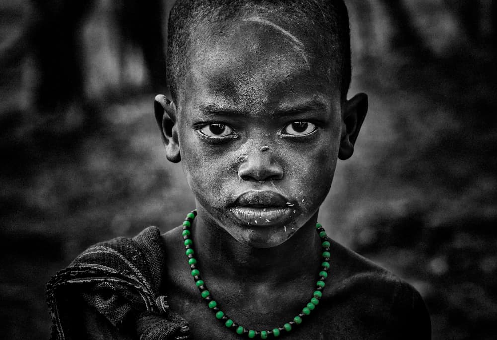 Intense Boy Portrait by Joxe Inazio Kuesta Garmendia — canvas wall art