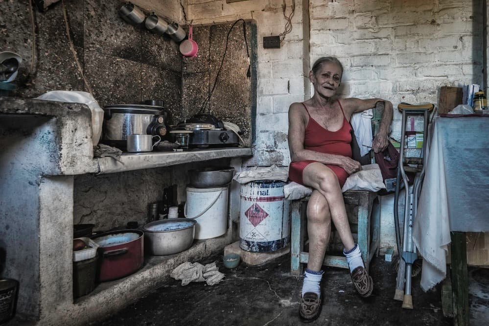 Elderly Woman Red Dress by Andy Bauer — canvas wall art