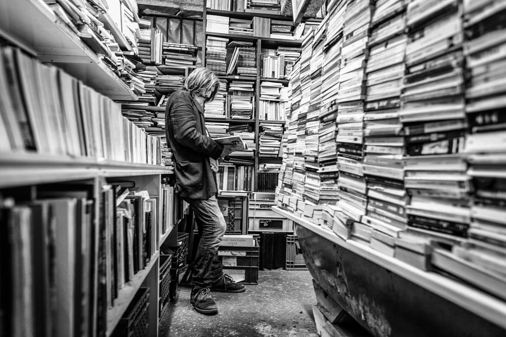 Man Lost In Books by Marco Tagliarino — canvas wall art