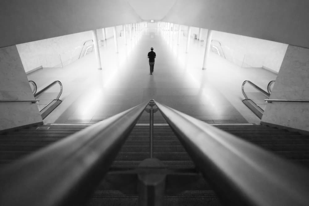 Lone Figure Down Corridor by Filipe P Neto — canvas wall art
