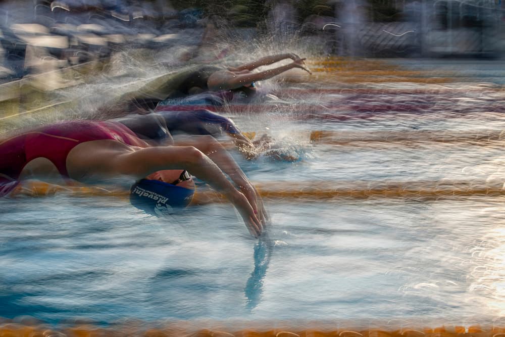 Dynamic Swim Race by Milan Malovrh — canvas wall art