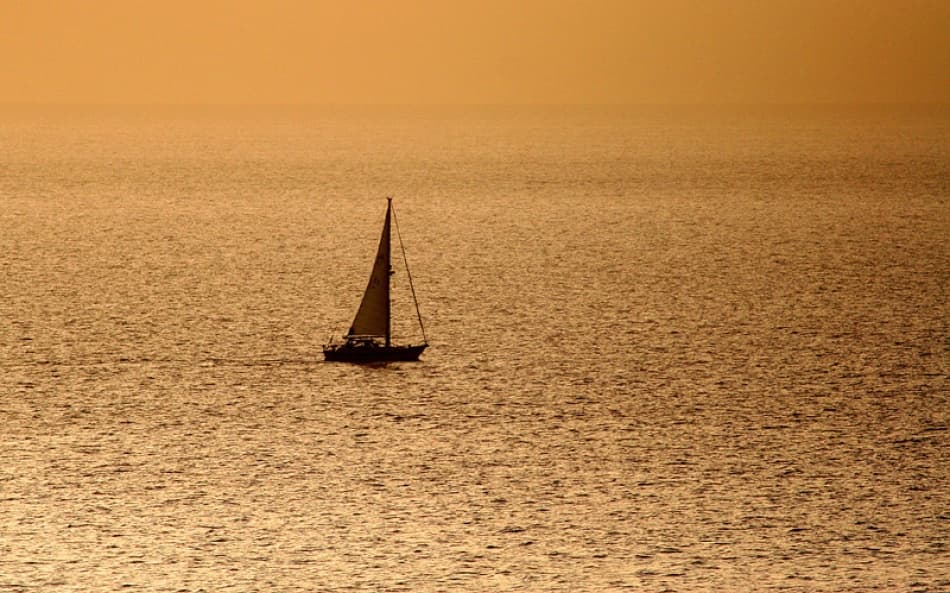 Solitary Golden Sailboat by Bror Johansson — canvas wall art