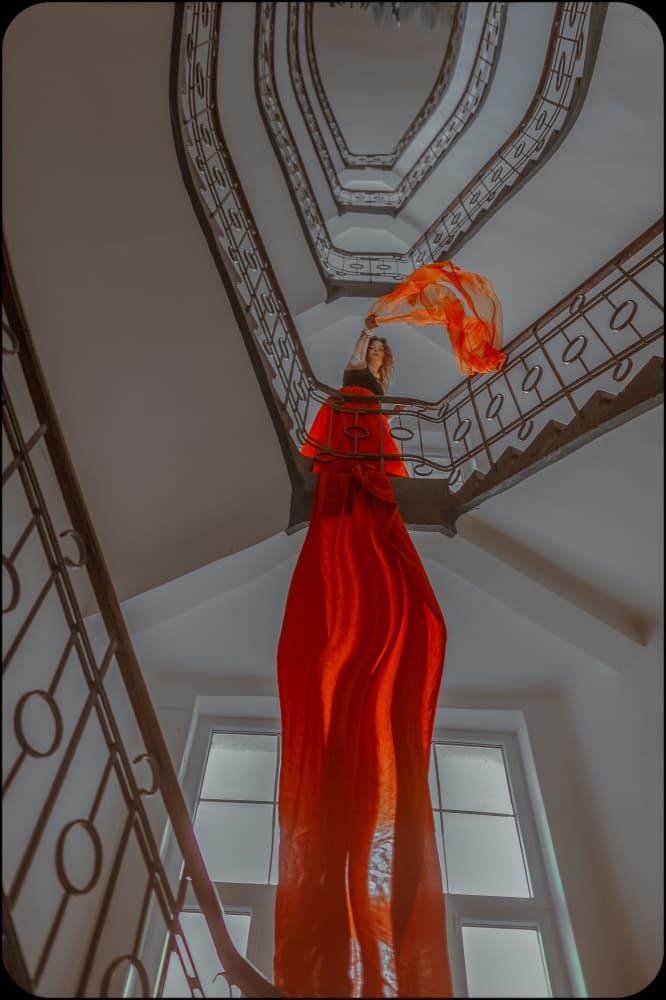Red Dress Spiral Stairs by Barbora Biňovcová — canvas wall art