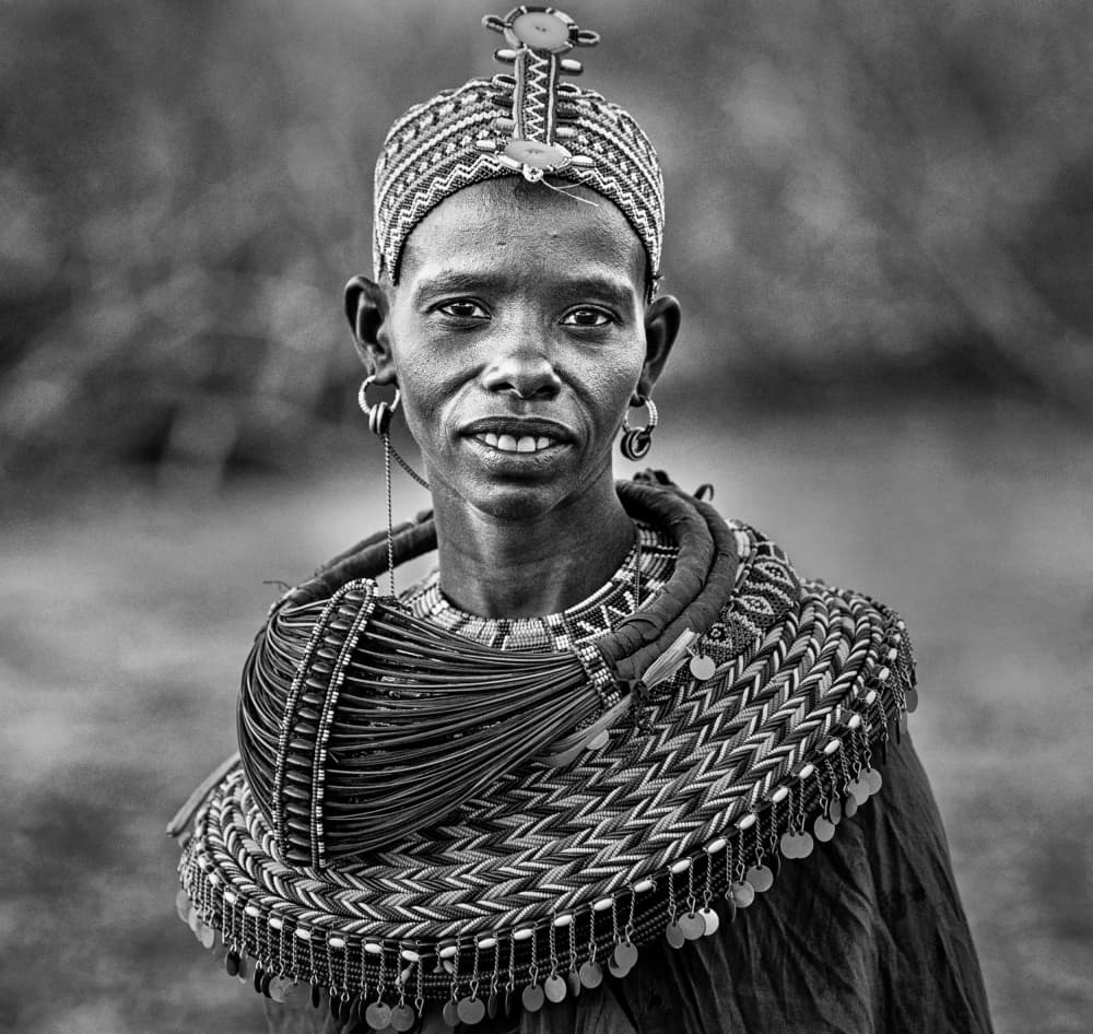 Smiling Tribal Woman by Joxe Inazio Kuesta Garmendia — canvas wall art